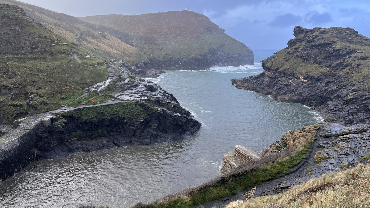 The rugged Cornish coastline at Boscastle, with a path winding towards the sea