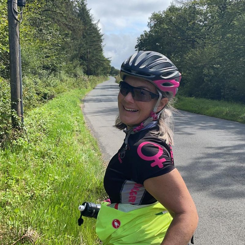 Vicky out on her road bike on a country lane