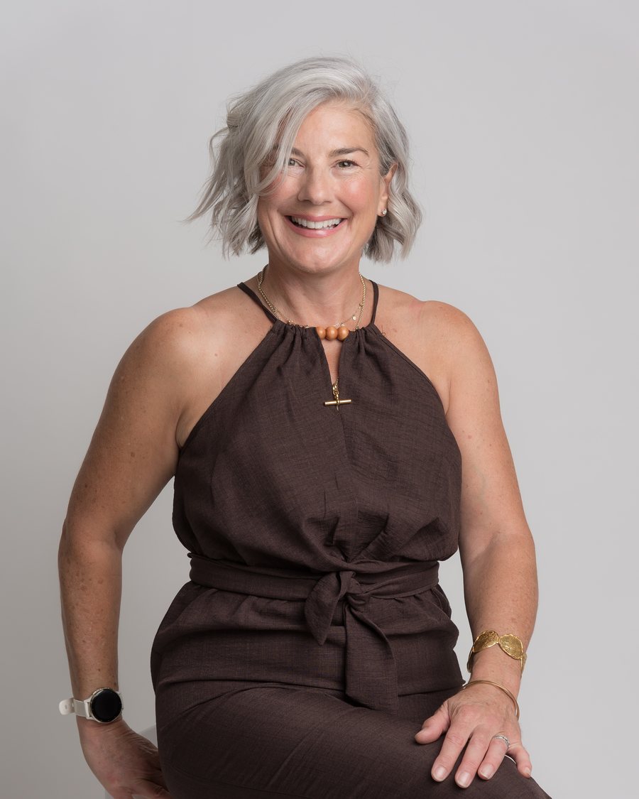 Victoria Chudleigh-Emson seated, relaxed and smiling